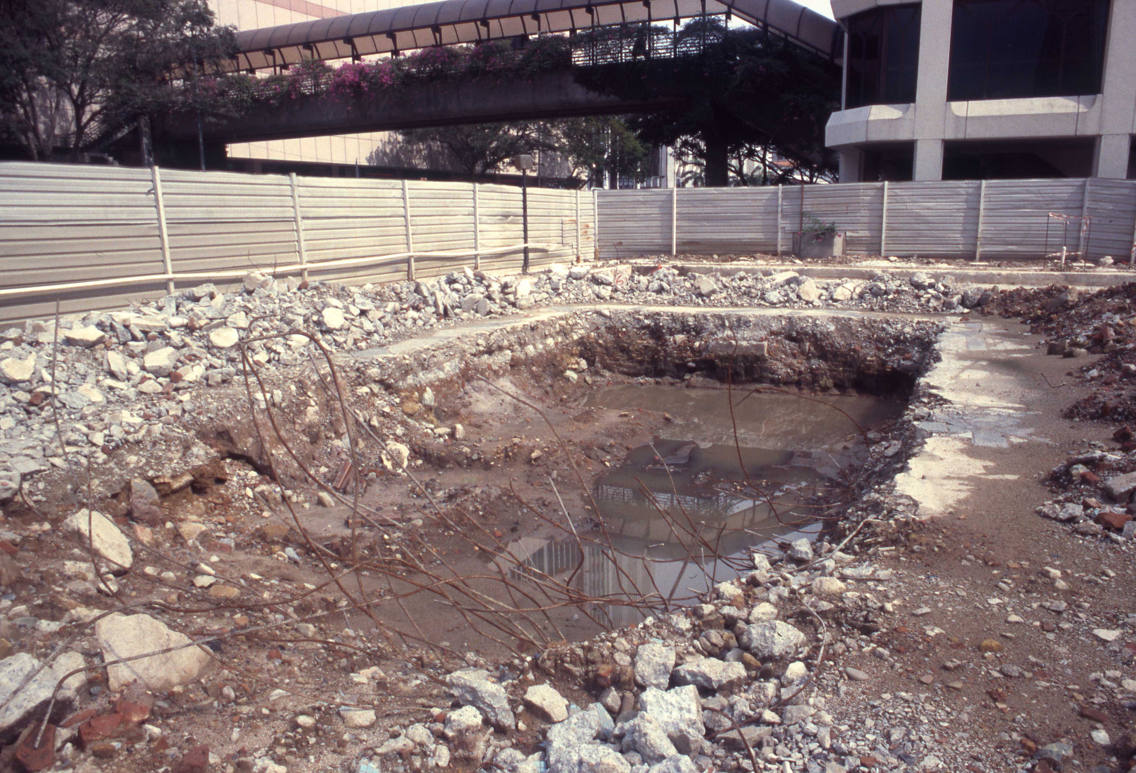 Square II at the end of the excavation with Adelphi Building in background; this illustrates the working conditions at the site.
