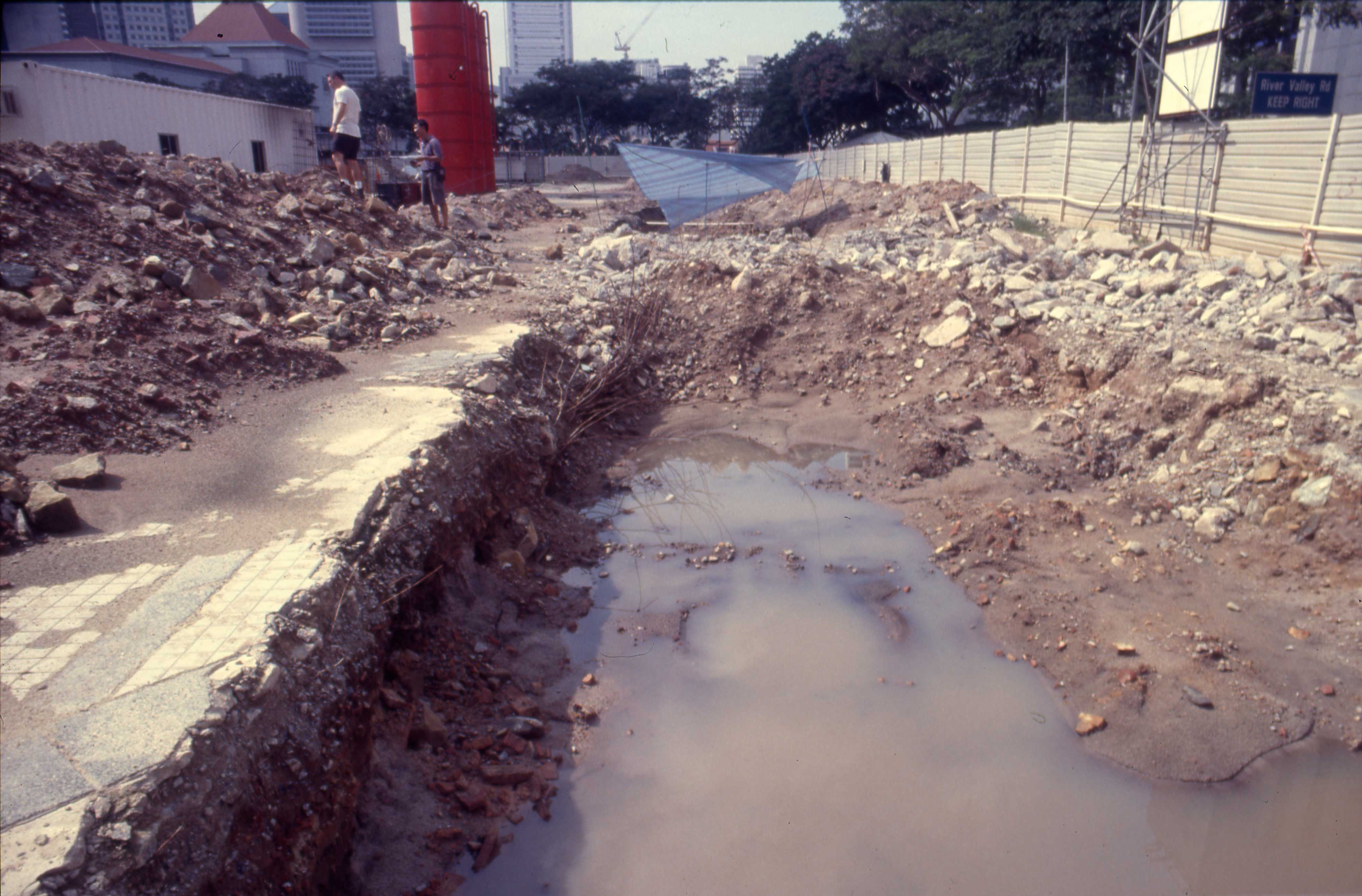 Square II, again after heavy rain, showing disturbance caused by excavation of the foundation of a 19th-century building into the 14th–16th century stratum.
