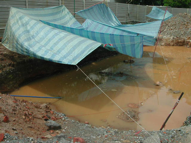 CCT Square I Dec24 flooded excavation pit.