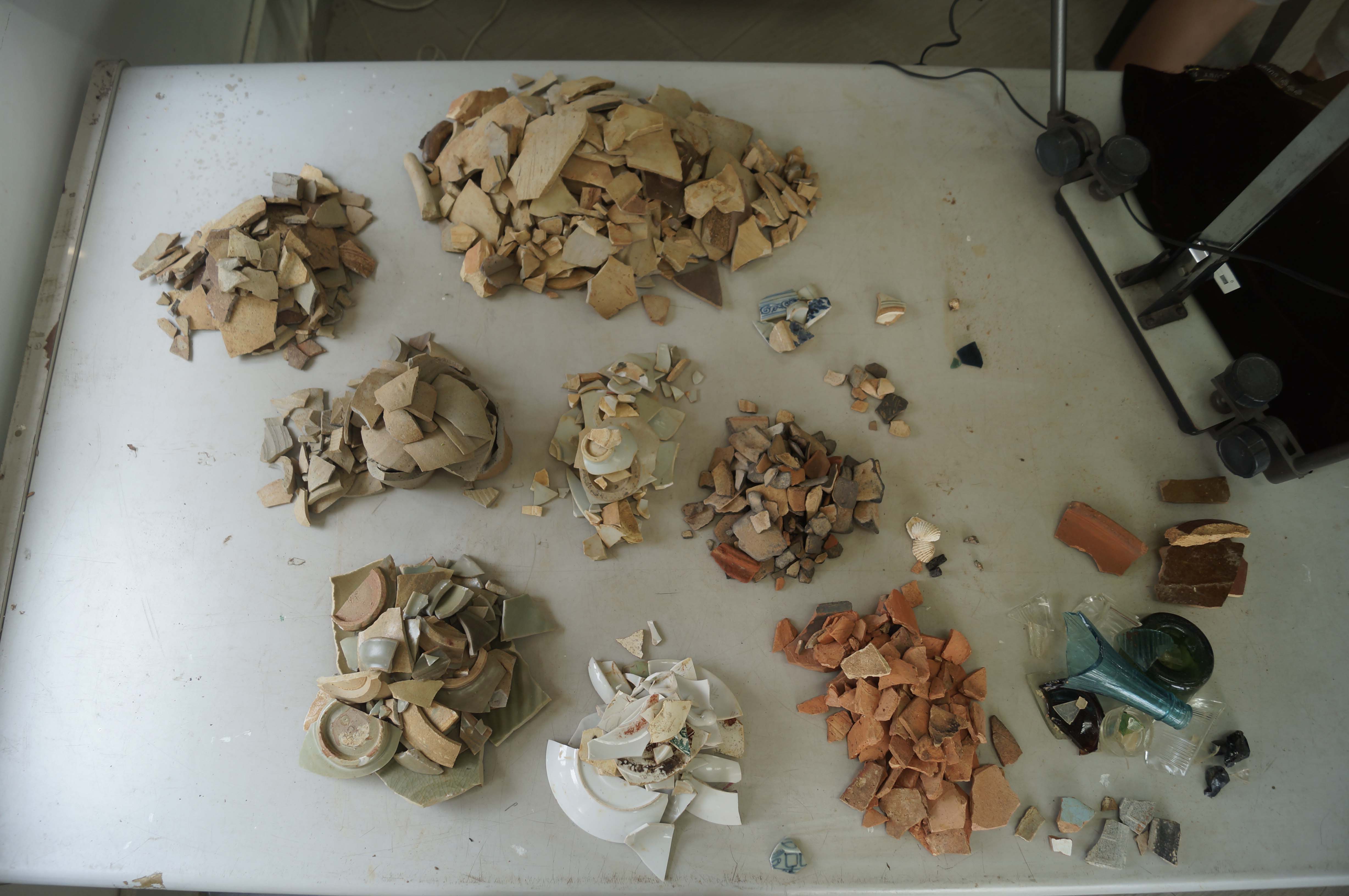 Figure 6. Artefacts salvaged up by laborers at Fort Canning Dig site (April/May 2019).