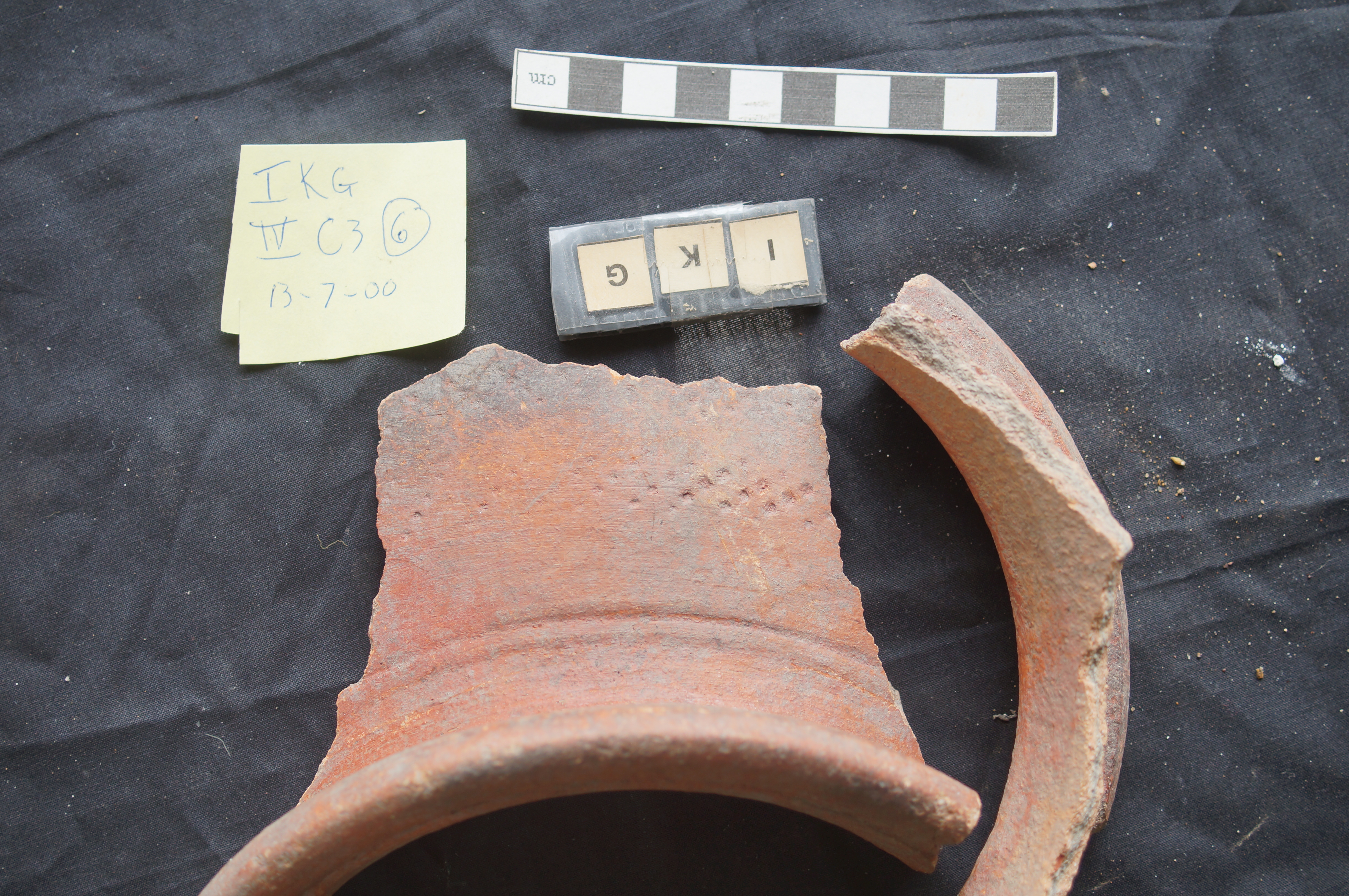 Fig 19. Malay orange slipped earthenware pot