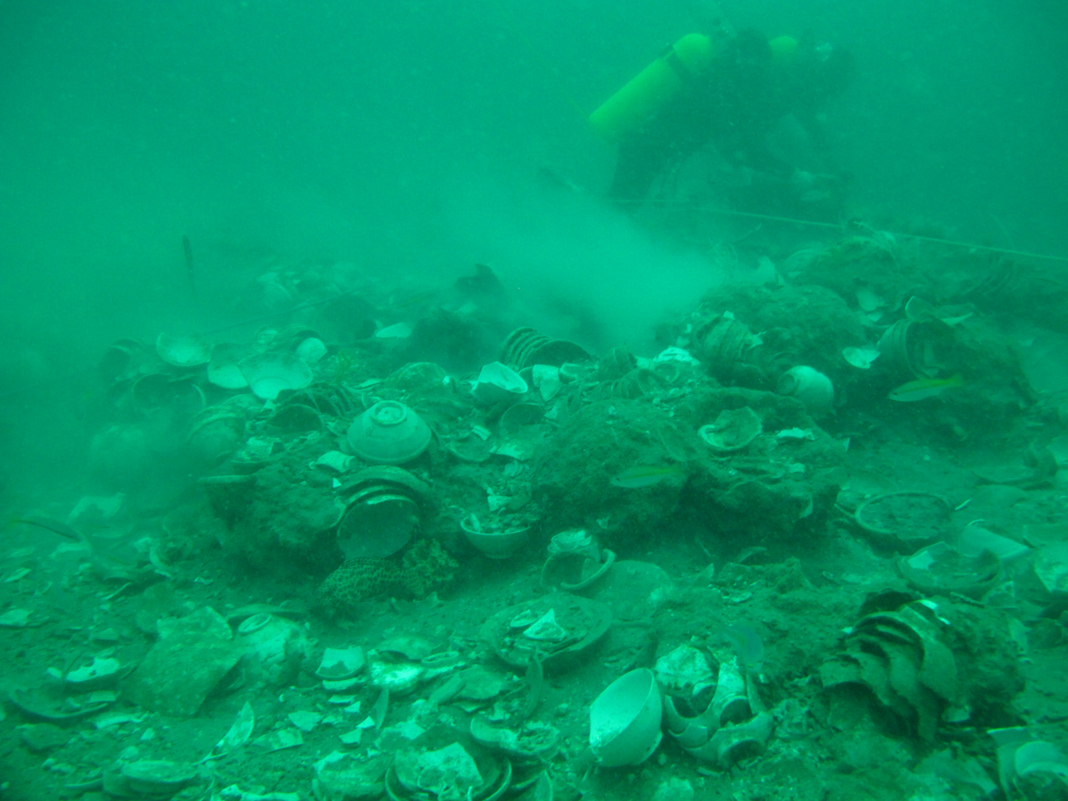 Large iron concretions with entrapped ceramics.