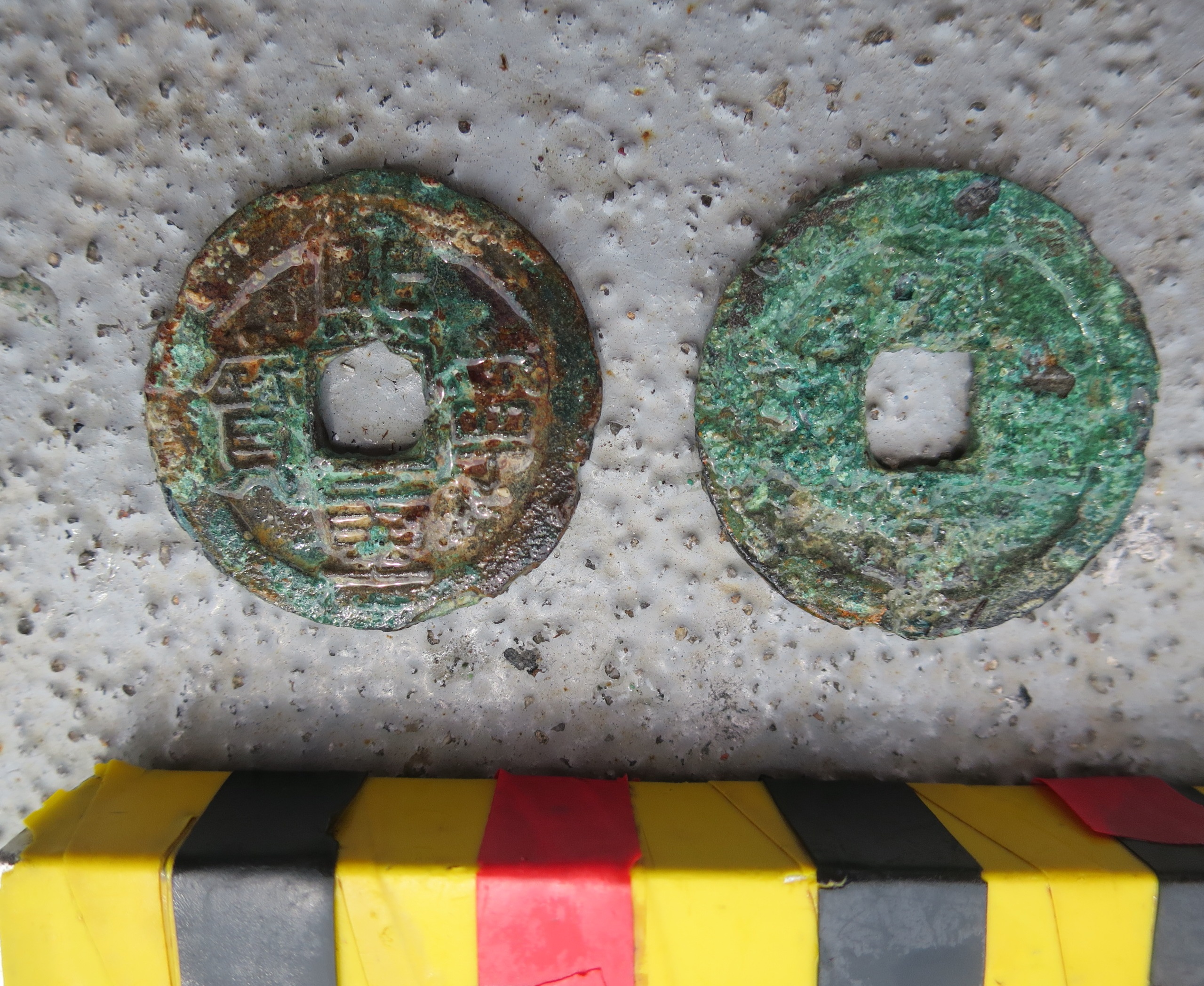 Chinese coins marked Xi Ning Zhong Bao, 1068-1077 CE.