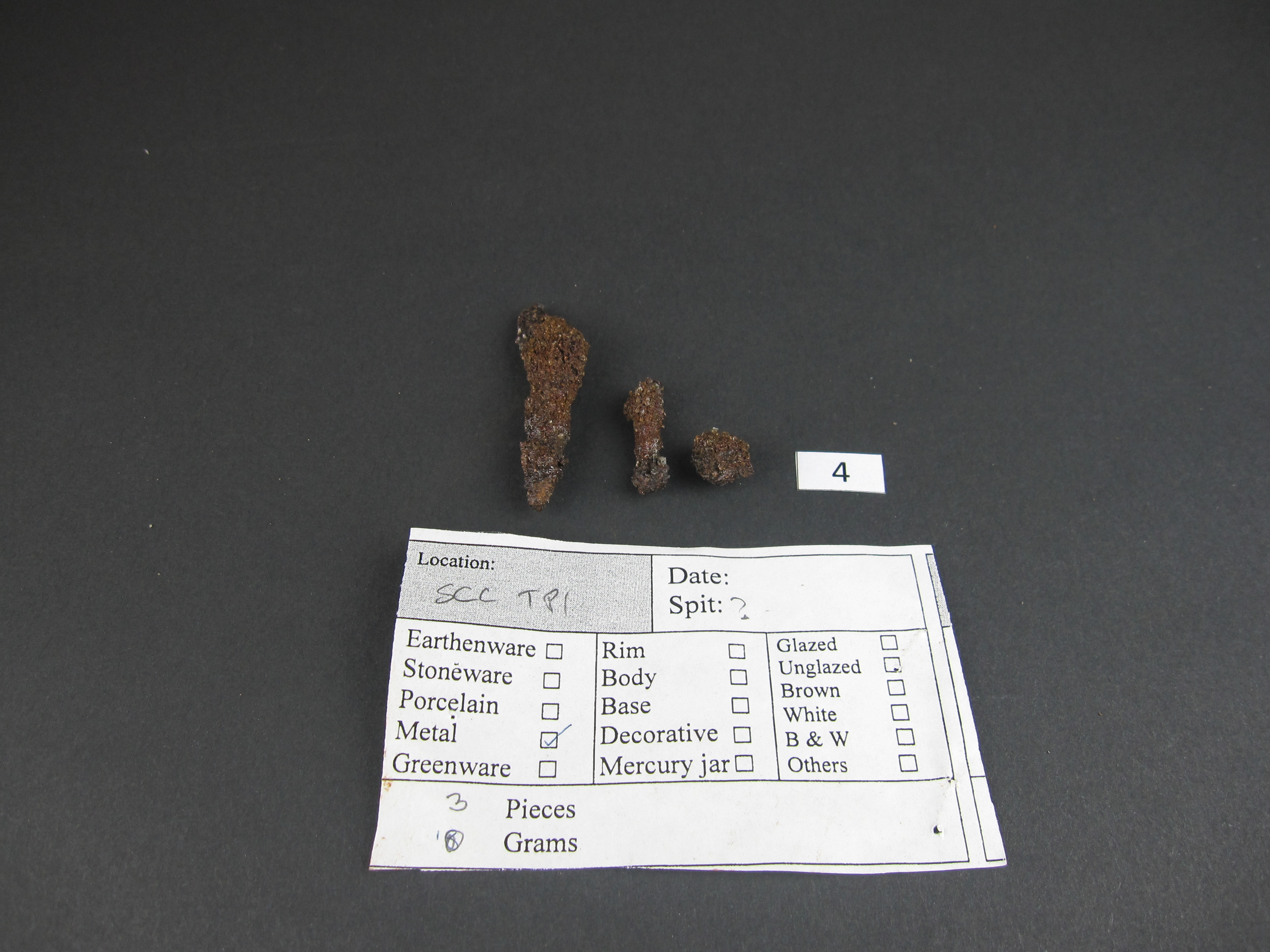 <strong>Plate 2</strong> Iron slags after treatment. Surface cleaned and coated with 20% B72.
