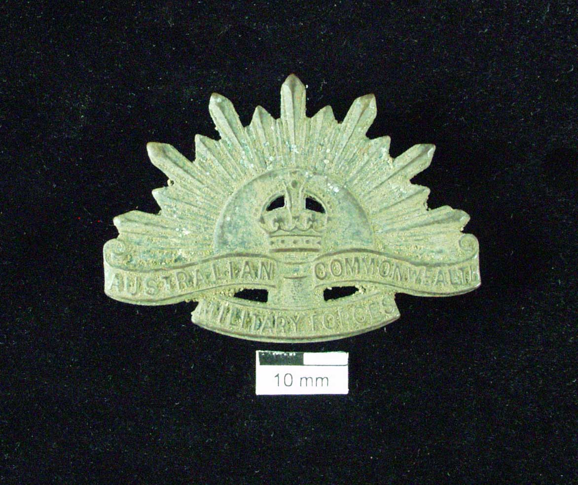 Figure 21: A military badge from the Australian Commonwealth Military Forces, probably left behind by one of the soldiers who were at the emergency hospital established on the cathedral’s grounds during WWII